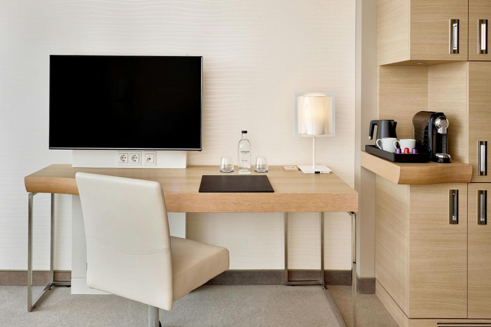 Hotel The Westin Hamburg Elbphilharmonie Exterior foto A Nespresso machine in a hotel room
